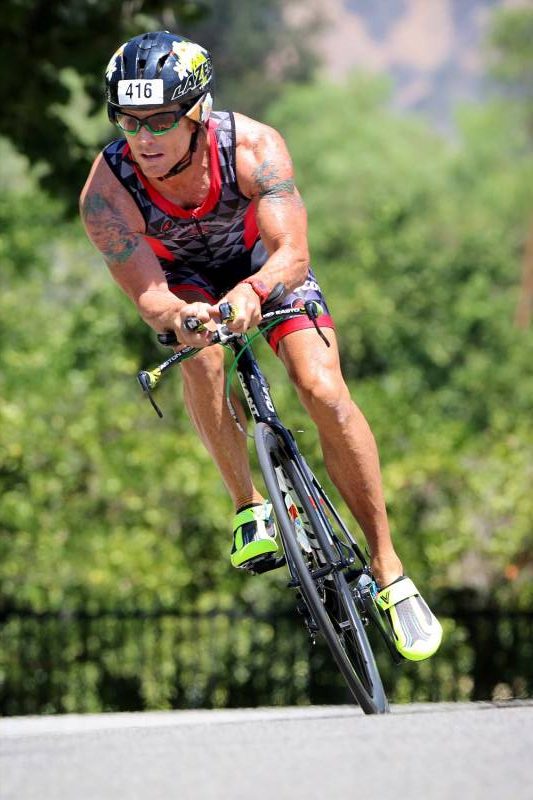 Cyclist racing on a road bike