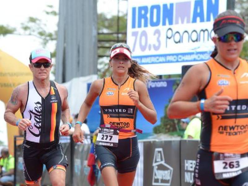 Triathletes competing in outdoor race event